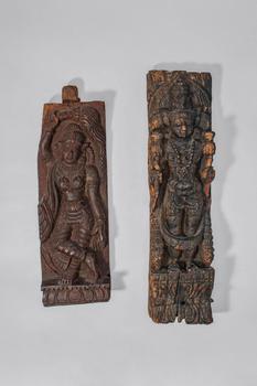 Ca. 18th-19th century AD.
A carved pair of wooden architectural panels, each depicting a Hindu de