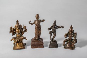 Ca. 14th-19th century AD. A group of four cast bronze figures depicting various Hindu deities, in
