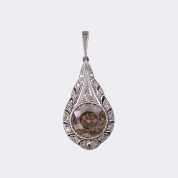 Natural Art Deco Zircon with reversible Colour Change as a Pendant with Diamonds.