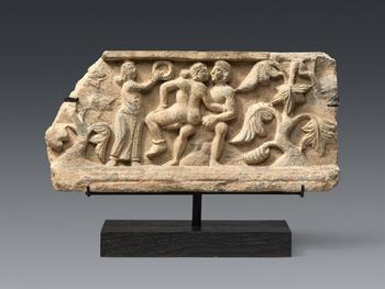 A Gandharan grey shist fragment of an amorous couple. Pakistan. Kushan period, around 2nd century