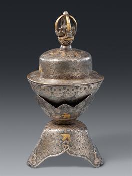 An Eastern Tibetan gold and silver damascened iron altar kapala. 16th century