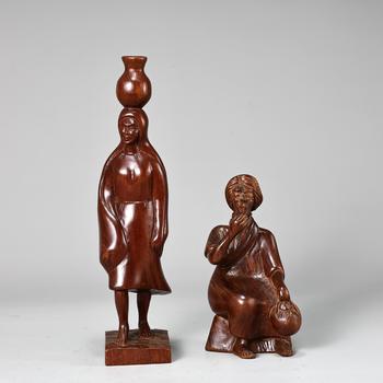 Vintage Wood Hand Carved Smoking Man And Woman Sculptures