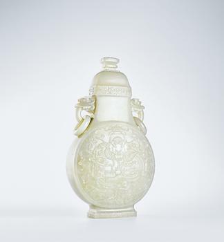 清乾隆 白玉浮雕八寶龍紋活環(huán)耳蓋瓶