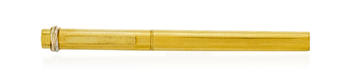 Cartier, un stylo bille en métal doré