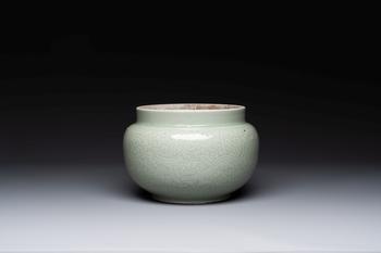 A Chinese celadon-glazed bowl with incised chilong among floral scrolls, Kangxi