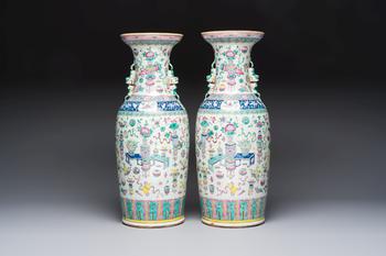 A pair of Chinese famille rose 'Antiquities' vases, 19th C.