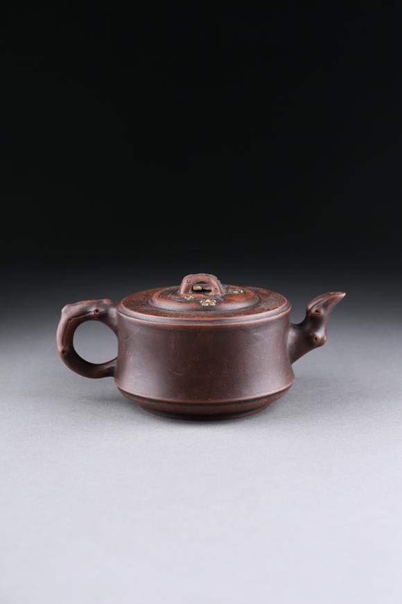 萬領(lǐng)國(guó)際紫砂竹紋梅花壺