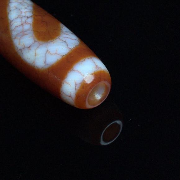 北京唐潮拍卖有限公司尼泊尔至纯包浆血丝【金钱铭天珠】