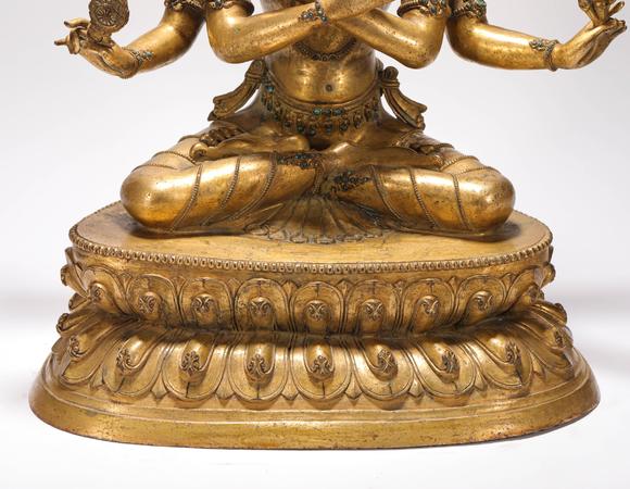 liaodu art auction清代铜鎏金三头六臂佛造像  a bronze gilt three
