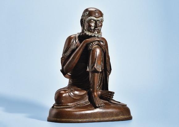 清铜雪山大士像