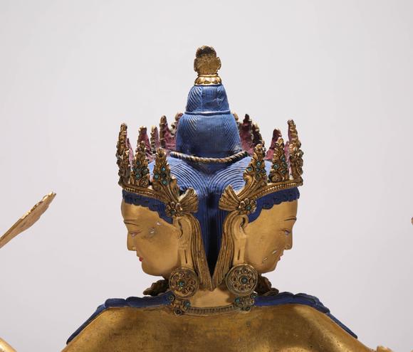 liaodu art auction清代铜鎏金三头六臂佛造像  a bronze gilt three